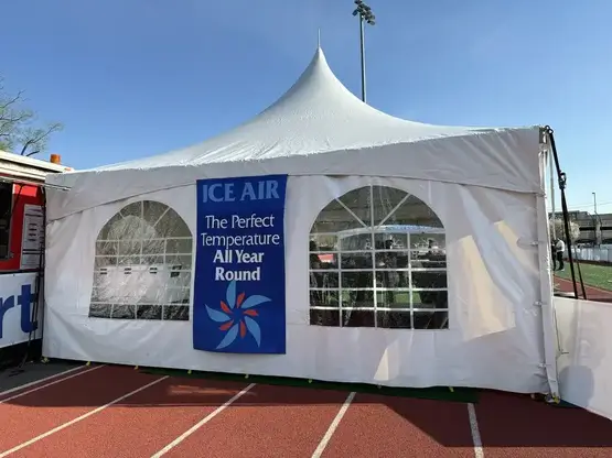 Ice Air’s branded hospitality tent at Memorial Field — The Perfect Temperature All Year Round.