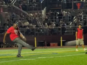 Ice Air’s Tom Glass, Vice President of Sales and Marketing, takes a kick on the Memorial Field pitch during halftime festivities.